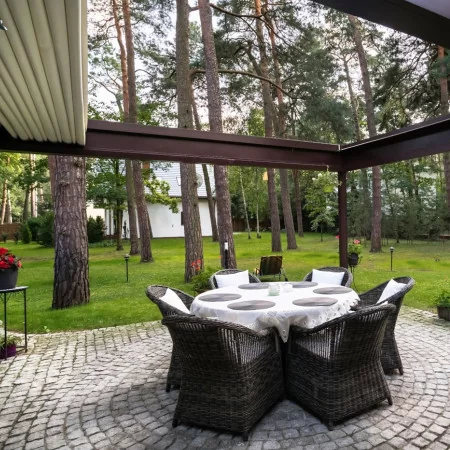 Pergola VACANCES adossée à toiture ouvrante rétractable pas chère