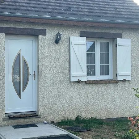 Superbe réalisation de volet alu blanc