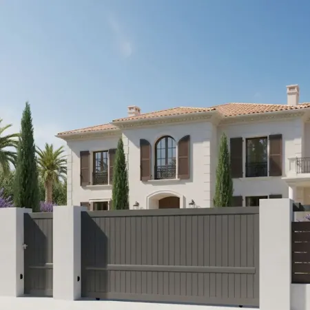 Vue devant une belle demeure le Portail Coulissant RAL Marron