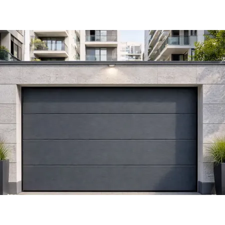 Porte sectionnelle de garage anthracite intégrée à un immeuble résidentiel en environnement urbain