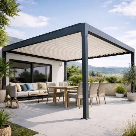 Pergola bioclimatique Lucia îlot en aluminium anthracite installée sur terrasse moderne, vue panoramique sur jardin et collines