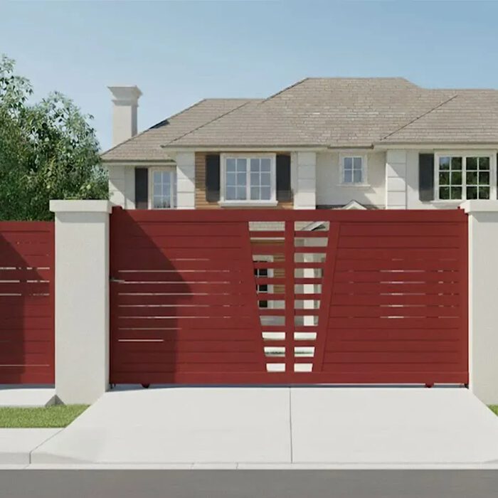 Portail coulissant COLN rouge devant une maison bourgeoise