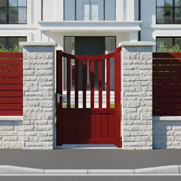 Portillon aluminium ICO rouge devant une maison de maître
