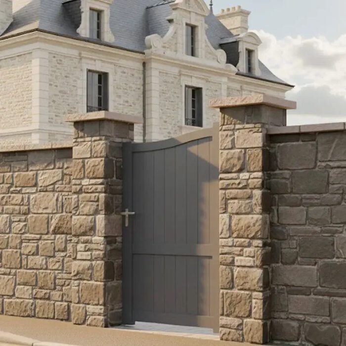 Portillon aluminium PLATA gris anthracite devant un mur en pierre