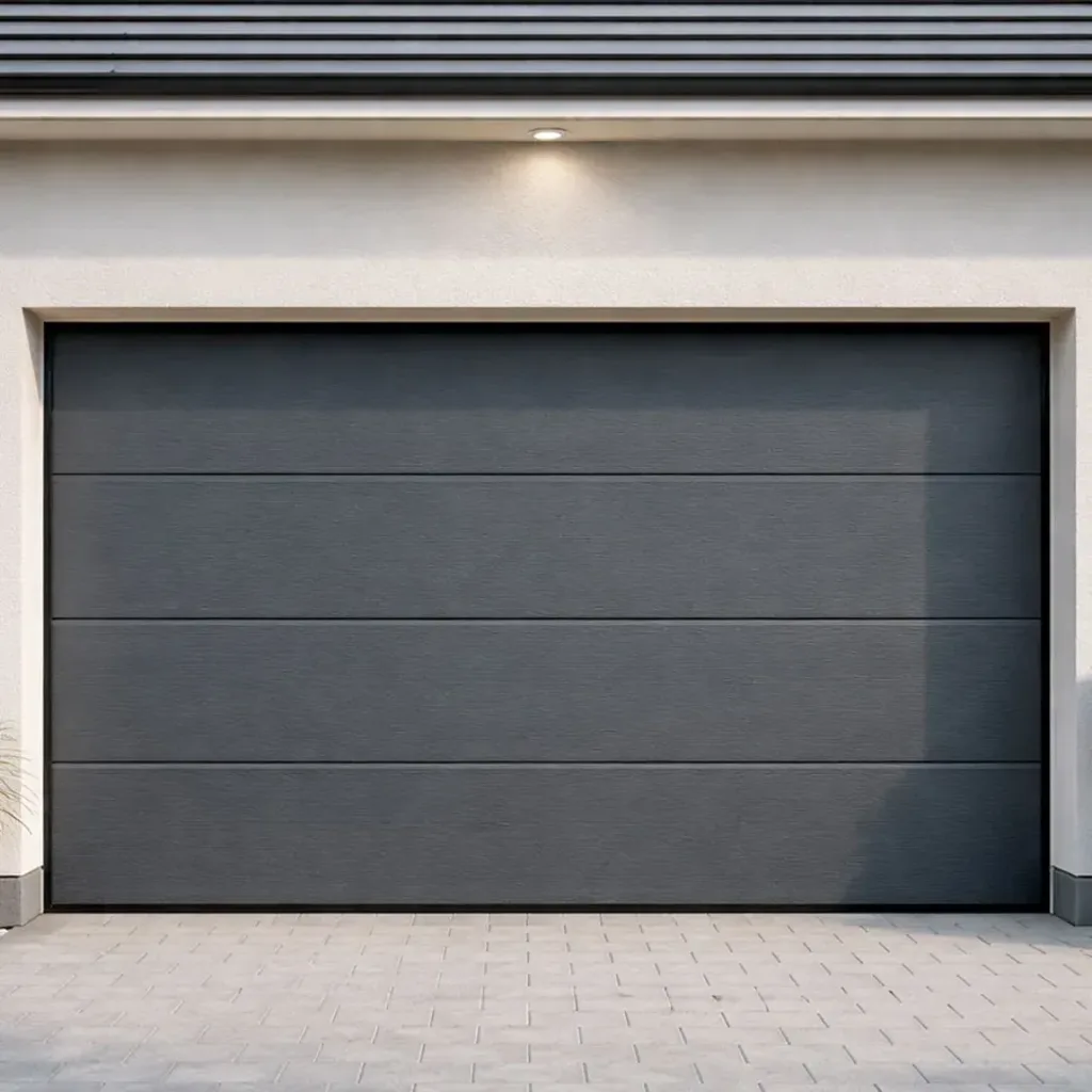 Porte de garage sectionnelle anthracite sur une maison contemporaine