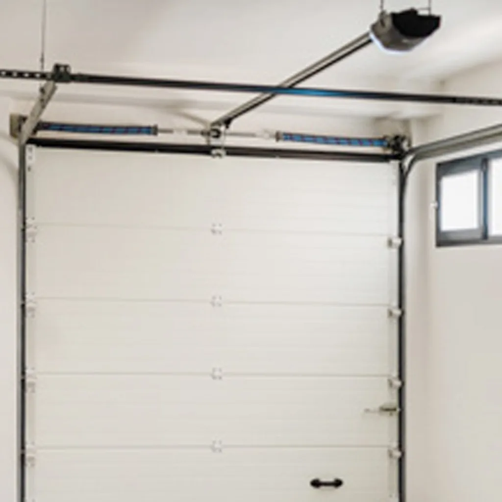 Porte de garage sectionnelle livrée en kit, éléments et quincaillerie