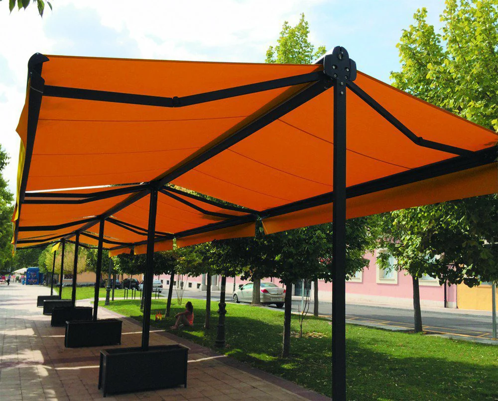 Store terrasse double pente XXL orange&nbsp;: tête centrale, coffre, bras articulés, pied et barre de charge
